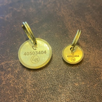 Dog sign in brass