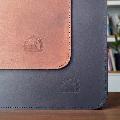 Leather placemats, brown with H.C. Andersen swan